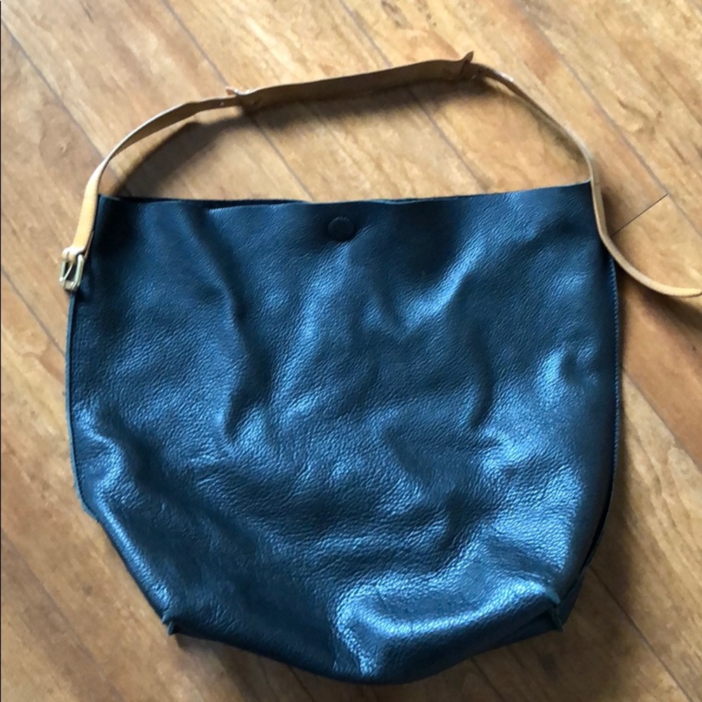 Black leather shoulder bag by Linea Pelle